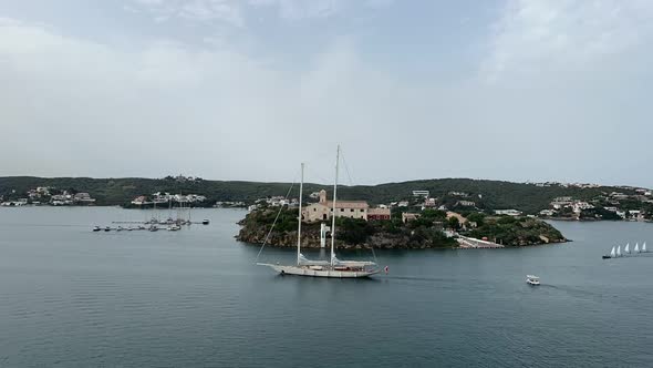 Timelapse of the King’s island, in Menorca, Spain, a great natural  bay, with many sailboats, in a r