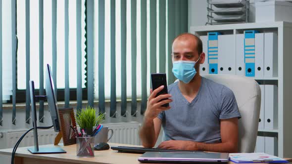 Man Wearing Mask Using Webcam