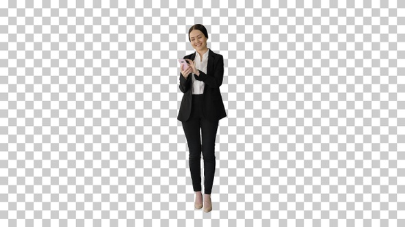 Smiling Businesswoman checking photos on her phone, Alpha Channel
