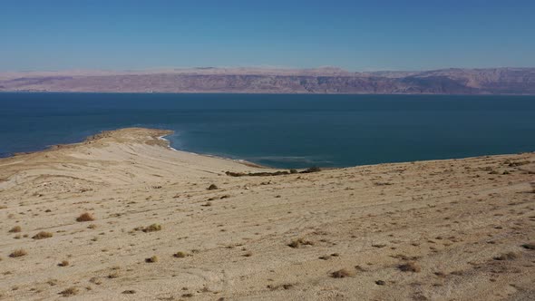 Israel, Deadsea, Panoramic view of the dead sea, sinkhole at the shore, beach