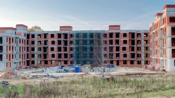 Construction Site with Buildings Under Construction and Multistorey Residential Homes Timelapse