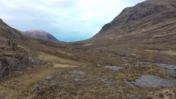 Two men hiking and exploring Highlands in Scotland