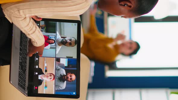 African Manager Woman Discussing with Remote Colleagues Using Video Call