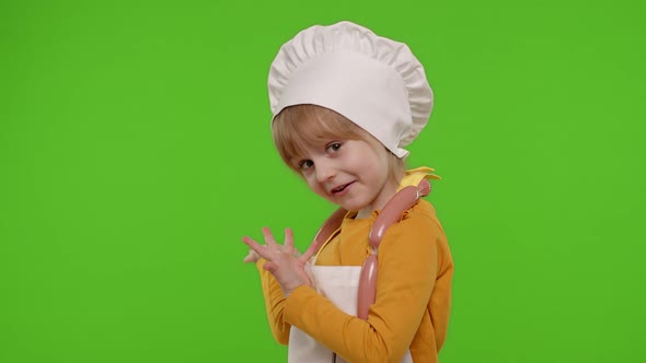 Child Girl Dressed in Apron Like Chef Cook Showing Approval Ok Sign Tasty Gesture Chroma Key