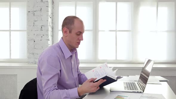 Businessman Working on Laptop