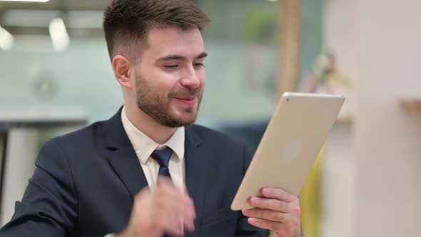 Young Businessman Doing Video Call on Digital Tablet