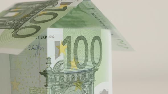 House made with hundred euro banknotes close-up 4K 2160p 30fps UltraHD  tilting   footage - Concept 