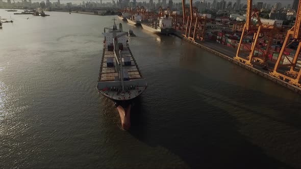 Logistic concept aerial View of maritime transport commercial dockyard with cargo ships, containers