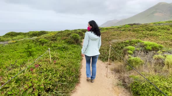 Asian Woman Hiking In Big Sur California