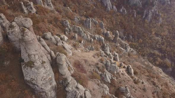 Rising Over Extreme Rocky Outcrop of Mountain Range
