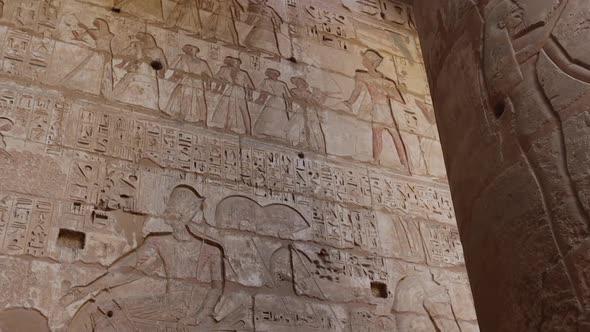 Ancient Drawings On The Walls Of The Medinet Habu Temple