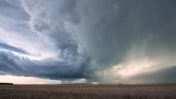 Time lapse of storm clouds rotating in the sky over the plains