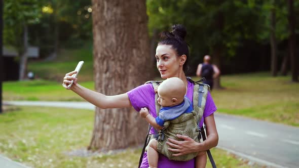 Woman Recording Video for Family Blog