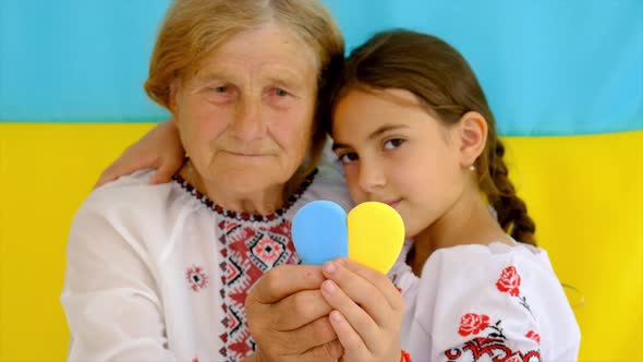 Ukrainian Grandmother and Granddaughter in Vyshyvanka