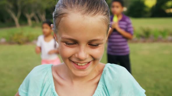 Portrait of girl smiling in garden