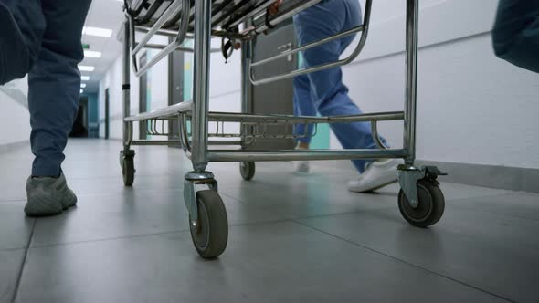 Doctors Feet Running Down Hospital Corridor