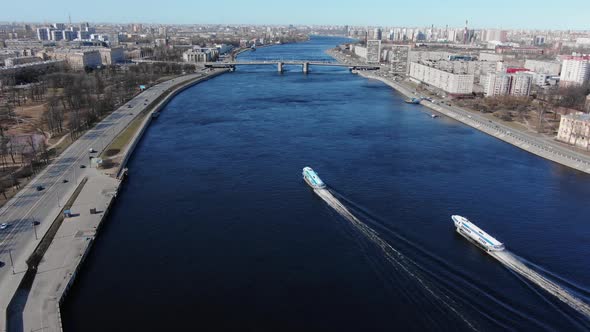 Water Trams Sail Along Tranquil River Running Across City