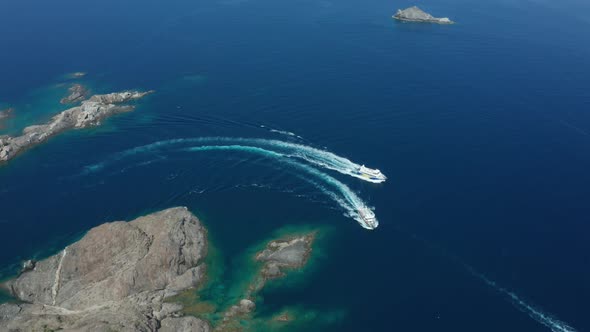 Drone Shot of Two Yachts Sailing Near Rocky Cape