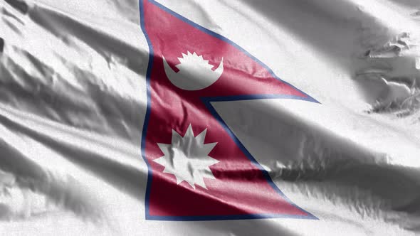 Nepal textile flag waving on the wind. Slow motion. 20 seconds loop.