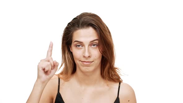 Young Beautiful Girl Pointing Finger Up Smiling Over White Background