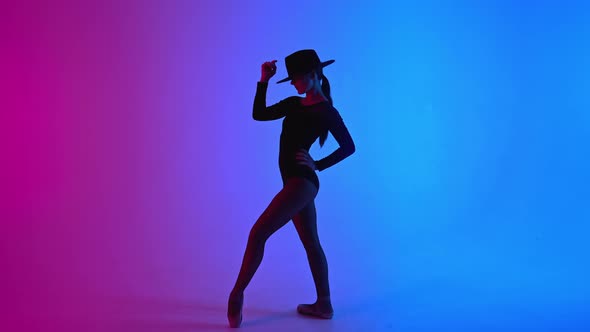 Contemporary Ballet Dancer Woman in Hat Posing on Multicolored Gradient Pink Blue Background