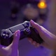 A Young Woman is Playing a Game Console - VideoHive Item for Sale
