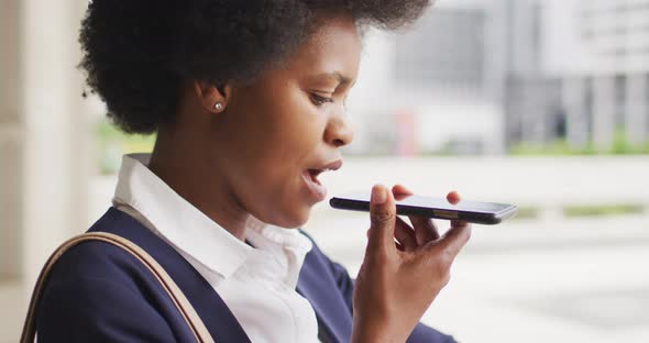 African american businesswoman talking on smartphone