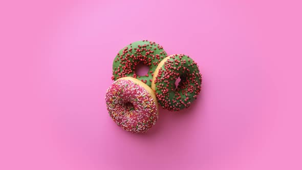 Top View Tasty Doughnuts with Glazed Chocolate Isolated on Pink