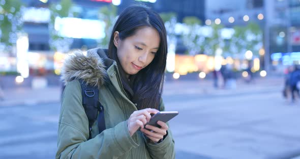 Woman Use of Mobile Phone at Night