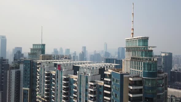 Guangzhou, China. Aerial revealing shot of congested building blocks and office building of Tianhe a