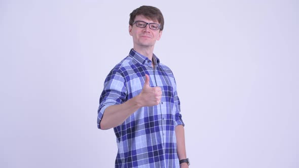 Happy Young Hipster Man Giving Thumbs Up