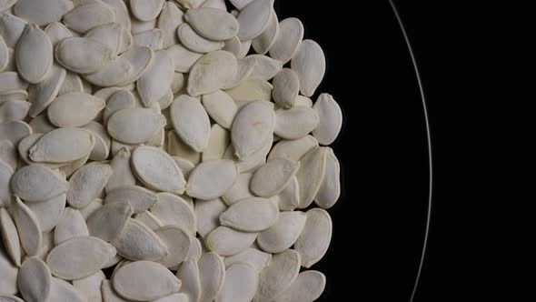 Cinematic, rotating shot of pumpking seeds - PUMPKIN SEEDS 022