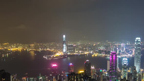 Hong Kong City Skyline Aerial Timelapse at Night with Victoria Harbor and Skyscrapers