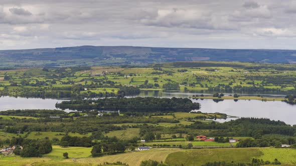Time lapse of rural agricultural nature landscape during the day in Ireland. alt