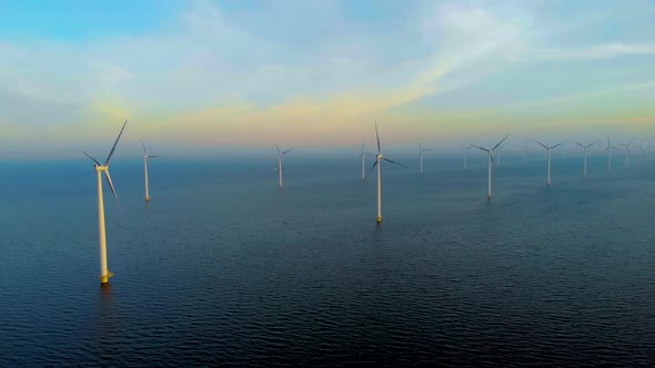 Windmill Park in the Ocean Drone Aerial View of Windmill Turbines Generating Green Energy Electric