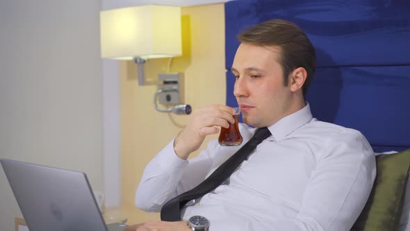 Businessman drinking tea.