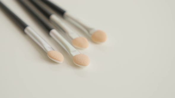 Eyeshadow makeup  brush set shallow DOF 4K 2160p 30fps UltraHD tilting video - Collection of accesso