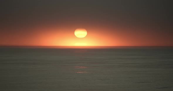 Beautiful sunset with fog above the north sea on Sylt