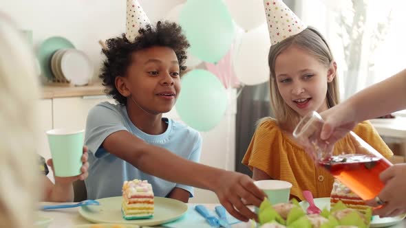 Kids Drinking Lemonade on Birthday Party