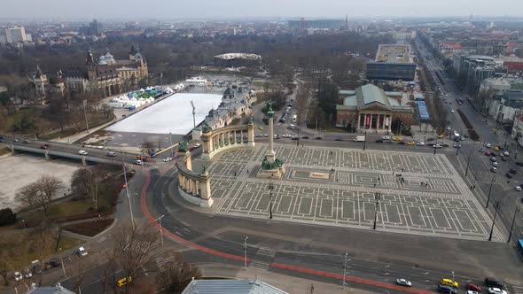 4K drone shot over Heroes square with Vajdahunyad castle view  in Budapest Hungary during a foggy da