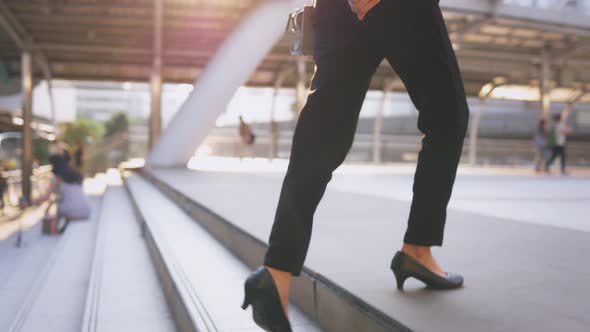 Young Woman Rushing for Work