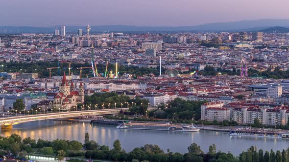 Aerial Panoramic View Over Vienna City with Skyscrapers Historic Buildings and a Riverside Promenade