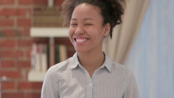 Portrait of African American Woman Shaking Head As Yes Sign