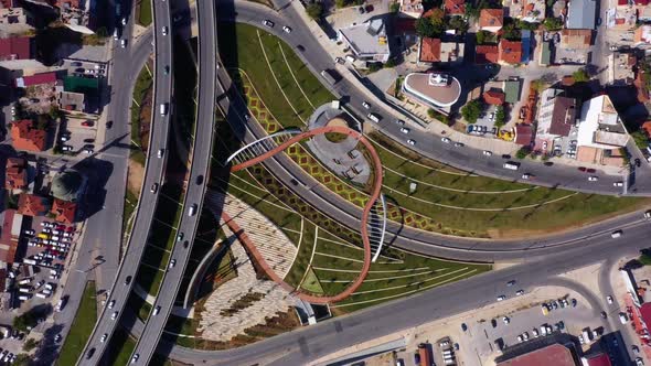 Apartment Buildings and Roundabout Road From Aerial View