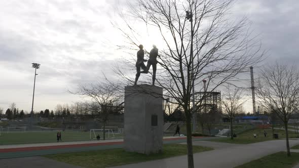 Hyperlapse shot of John Landy and Roger Bannister Miracle Mile bronze Statue in Vancouver. Soccer fi