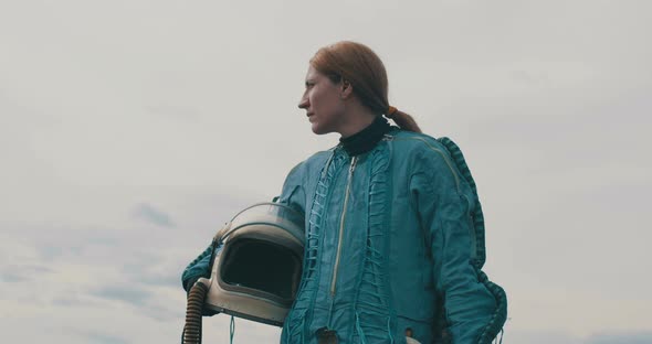 Female Cosmonaut Wearing Space Suit