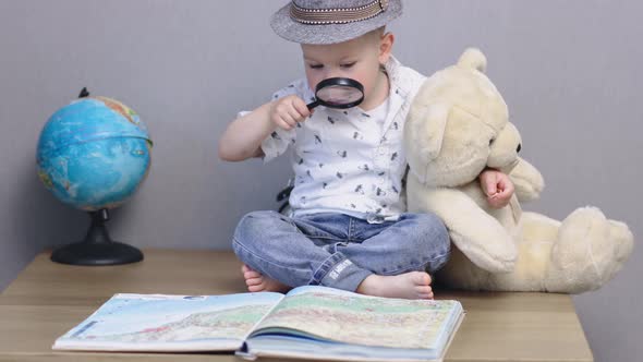 Funny Smart Baby Boy Toddler Hat Holding Teddy Bear Reading Big Book Magnifier