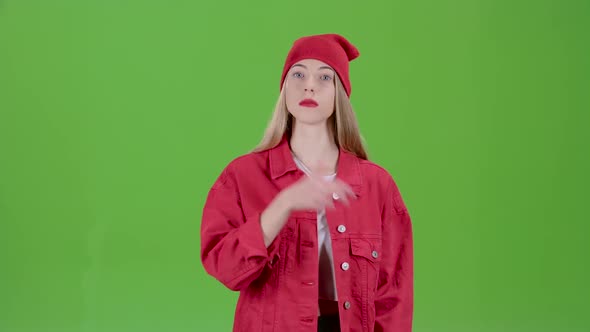 Girl Is Angry and Gestures That She Is Unhappy. Green Screen