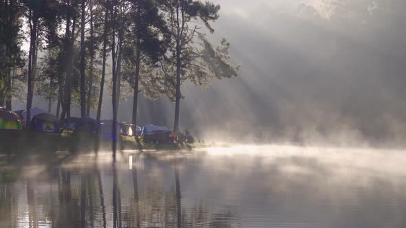 Fog or mist on river lake with forest trees in Pang Ung reservoir, Mae Hong Son, Thailand