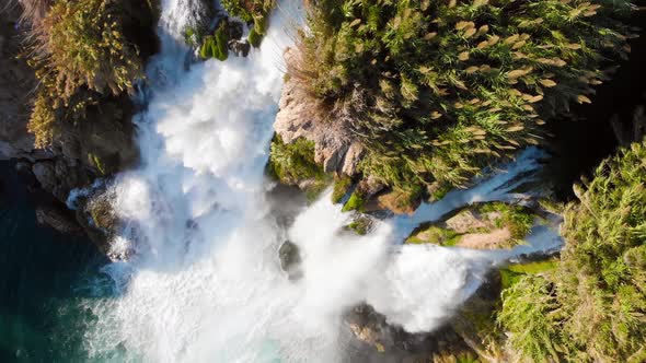 Top View of a High Waterfall Falling Into the Mediterranean Sea. Clean Ecology 